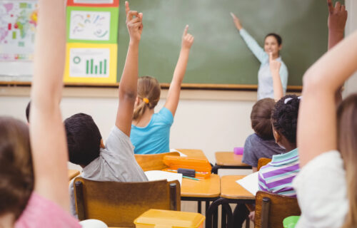 Teacher using direct instruction in whole class lesson.