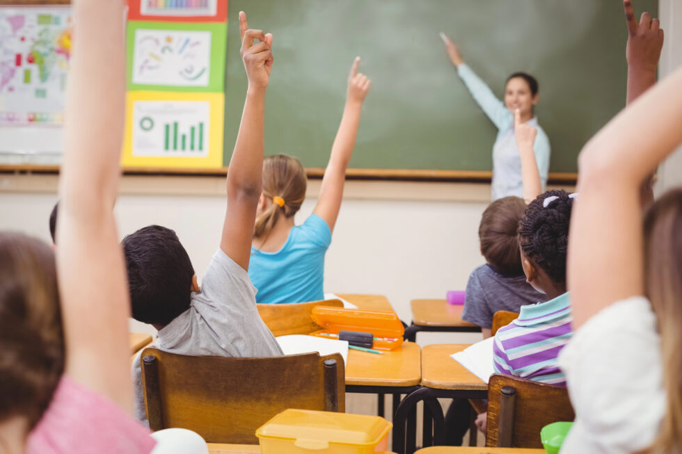 Teacher using direct instruction in whole class lesson.