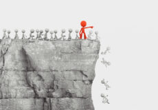 Red leader pointing small white figures off a cliff illustrates that following literacy trends can lead to confusion and ineffective results.
